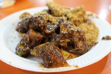 Rojak is a combo of fruit and vegies stir fried together (pineapples, mango, banana, cucumber, turnip, potato etc) and tossed in a sweet, tangy sauce made from lime, sugar and fermented shrimp paste.  Sounds disgusting.  Isn't.  Not my fave, but still interesting.