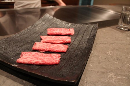 Japanese wagyu - the highest marbling rating.  Super fatty but cut so thinly and cooked on such a hot plate the fat just renders away.