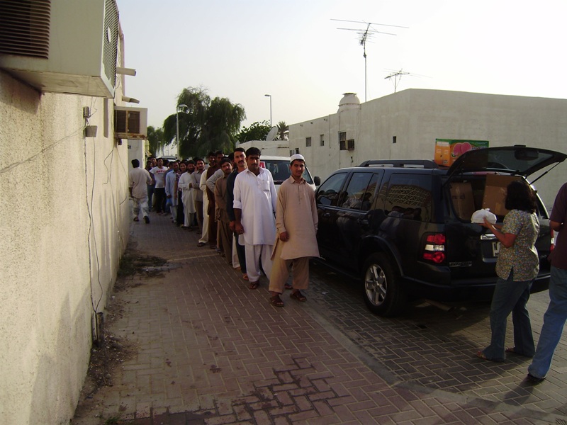 Getting in line.  Throughout the handout some cheeky men tried to cut in line but we sent them right to the back!  The whole thing ran like a very well oiled machine!  