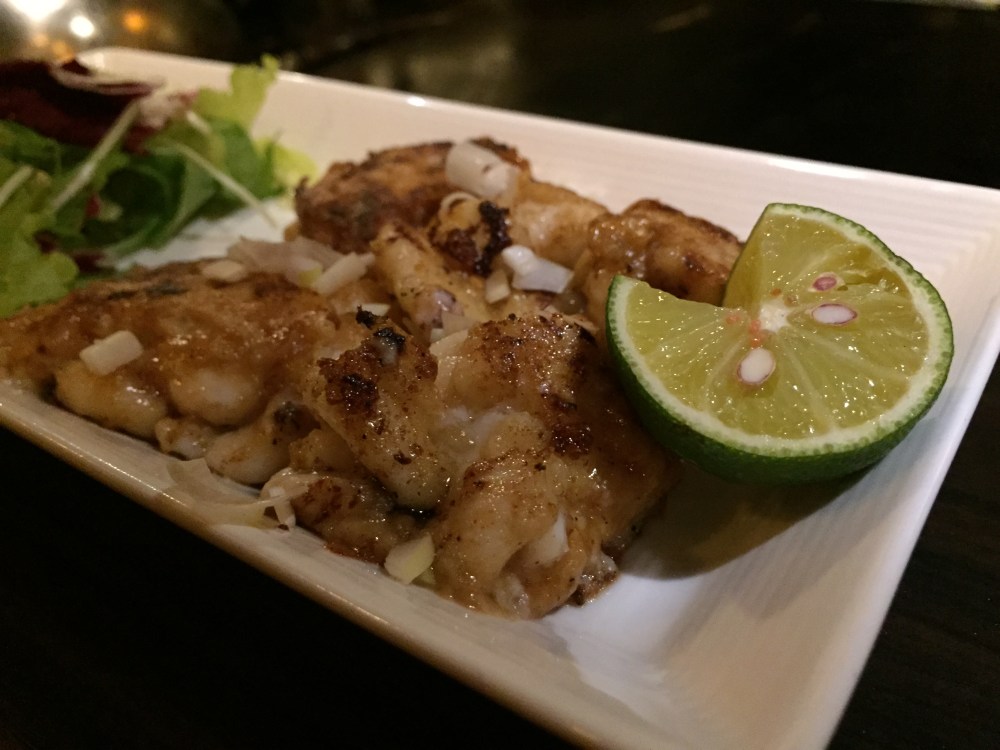 Shirako.  Also known as milt.  Also known as sperm-filled male fish genitalia.  Sounds terrible, tastes terrific when flash grilled in butter.  C'mon, be bold!!!