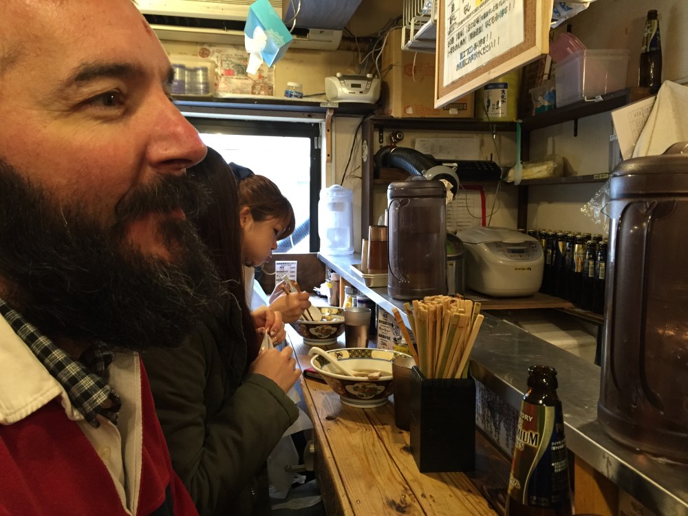 Right behind David are the stairs.  This place is miniscule - and always full. 