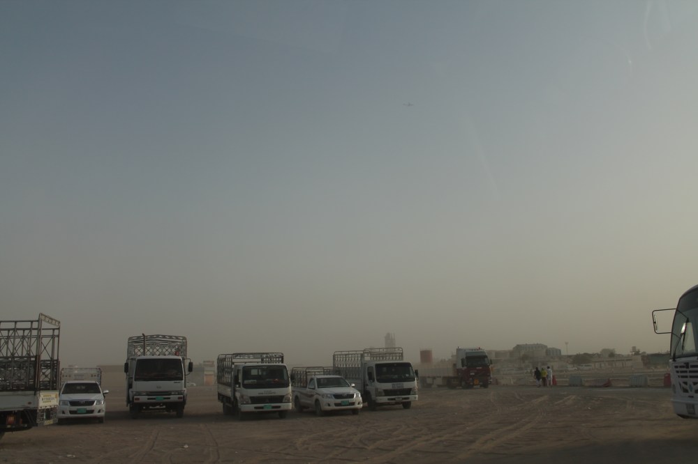 Arriving at Sajaa, an industrial area of Sharjah where many labourers and workers are stationed.  It's a dusty, desolate place with no streetlights and unpaved roads.  A glaring contrast to the city.