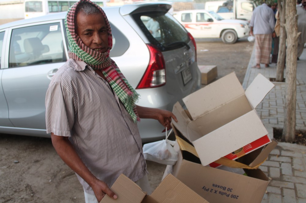 This guy will take the cardboard boxes that were used to transport some of the meals and recycle it, for pittance.  For some of the men, this is the only form of income they have here.  